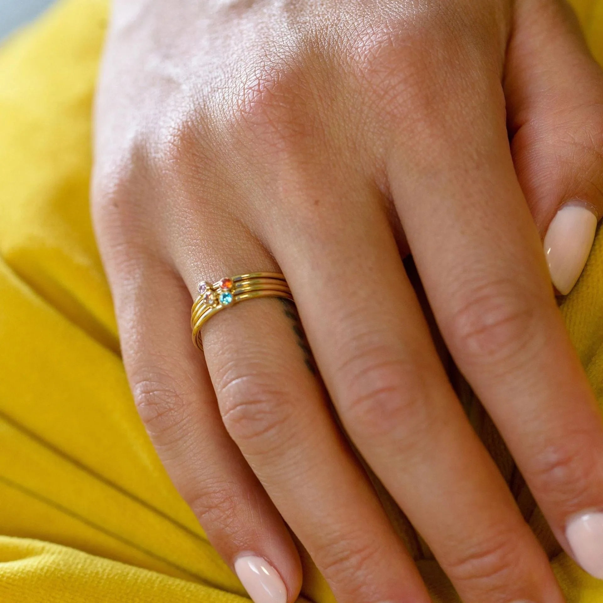 December birthstone ring with geometric engraving on titanium steel band