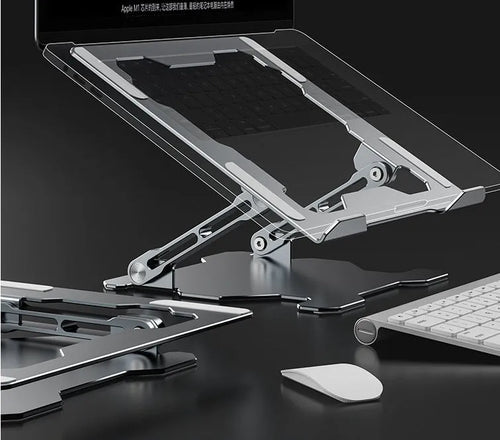 Grey aluminum folding laptop stand shown at an adjustable angle holding a silver laptop.