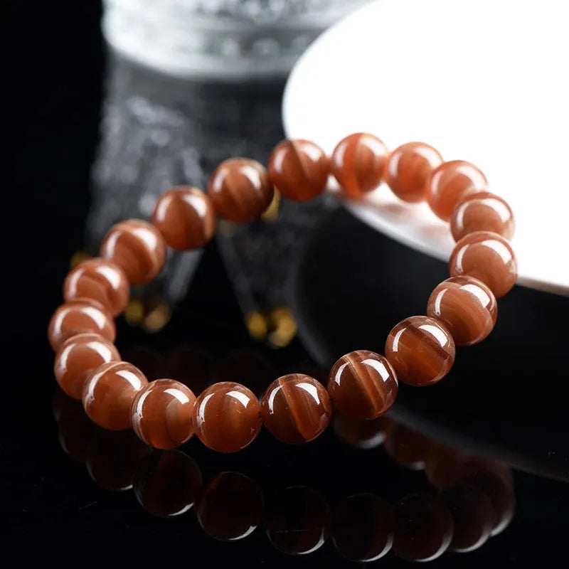 Natural Old Mine Rhodochrosite round bead bracelet with Ruyi elements in 6mm or 8mm bead options