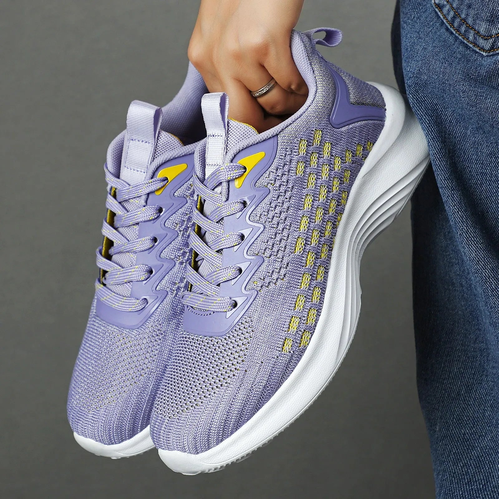 Women's lavender purple Flyknit running shoes with mesh upper and EVA sole for athletic use