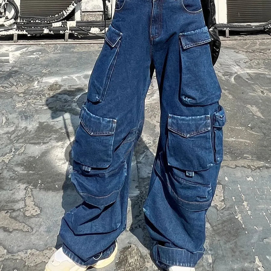 Dark blue distressed wide-leg jeans with high waist and multiple pockets on mannequin