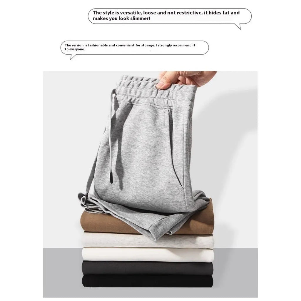 Straight-leg cotton sports shorts in light grey on a neutral background.