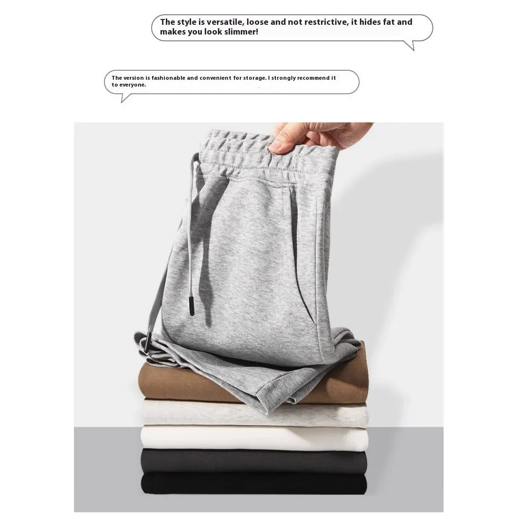 Straight-leg cotton sports shorts in light grey on a neutral background.