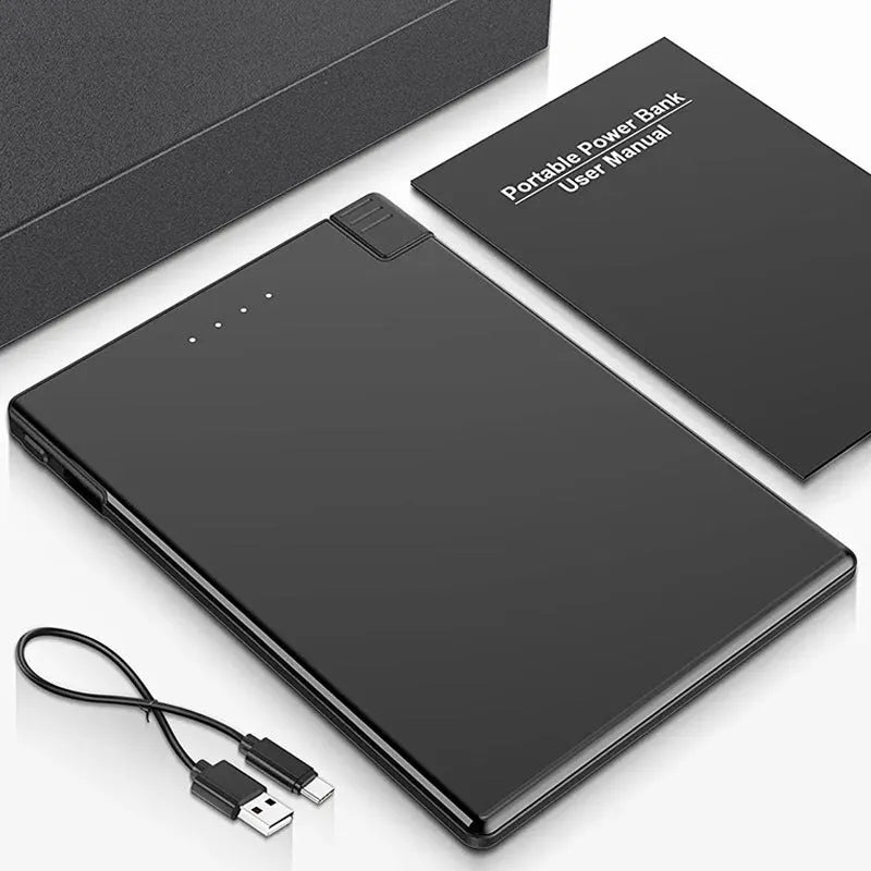 Ultra-thin black portable power bank with built-in cable, 2600mAh to 5000mAh, stainless steel PC TPE shell