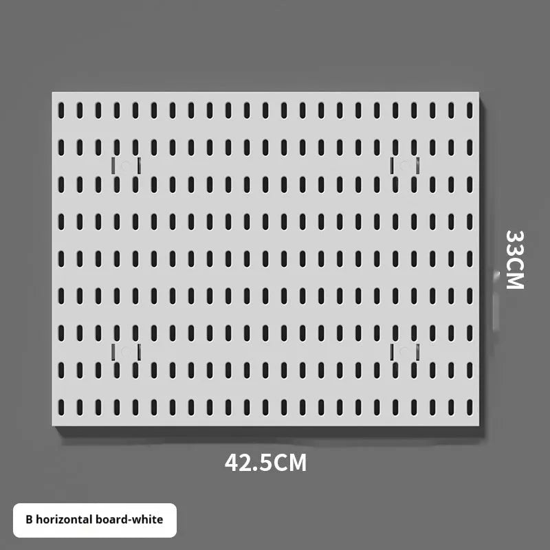 White plastic punch-free wire-wrap board organising cables on wall with modular panel design