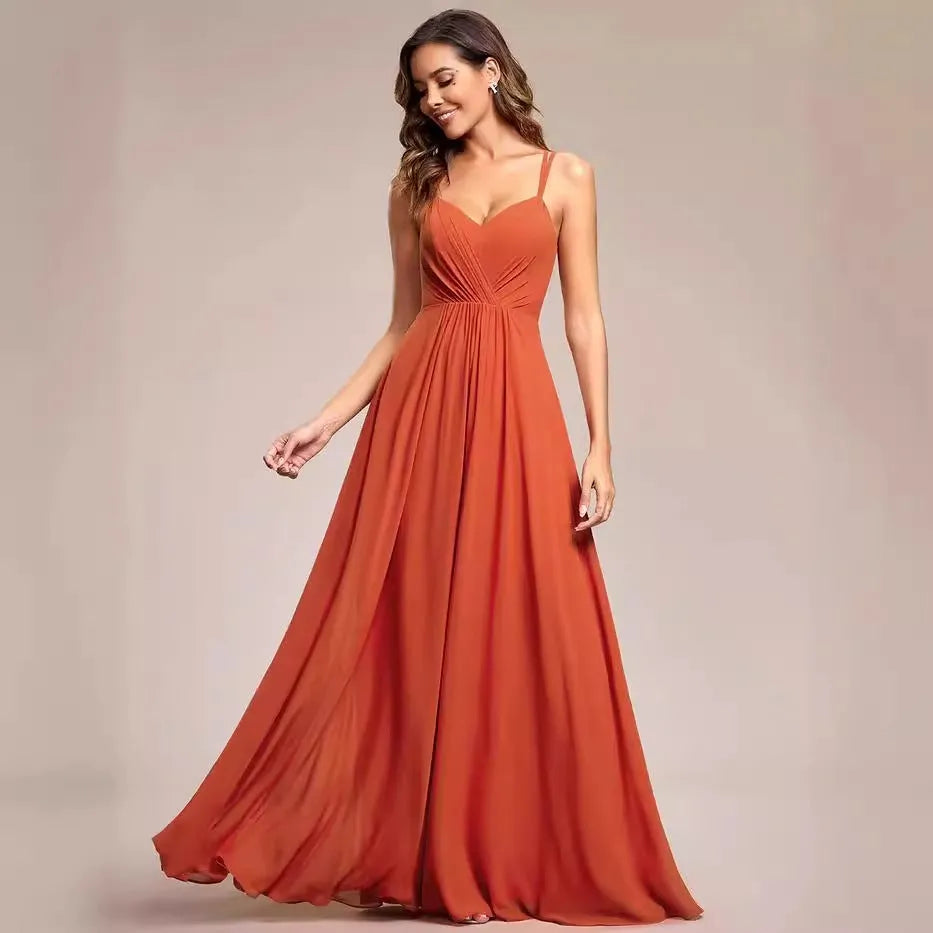 Women's long sleeveless A-line dress with pleated skirt in solid colour options