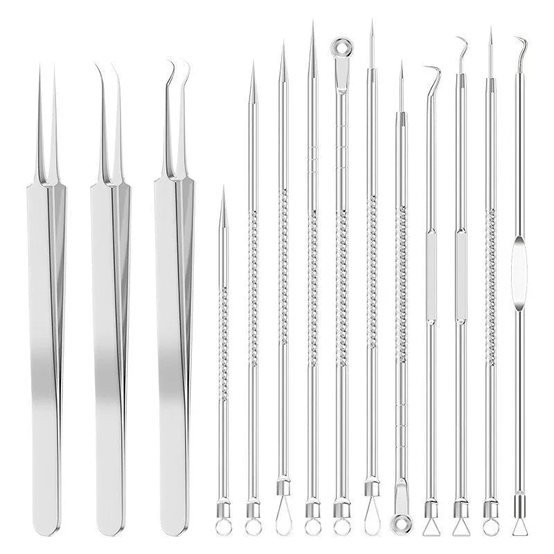 Four silver metal acne needles with ultra-fine pointed tips for skin treatment.