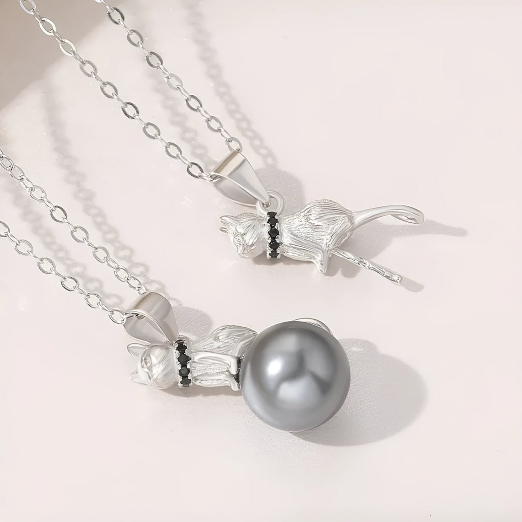 925 sterling silver cat pendant necklace on a chain, elegant style, shown in two colour finishes.