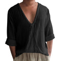 Men's solid colour long sleeve V-neck T-shirt in washed cotton fabric.