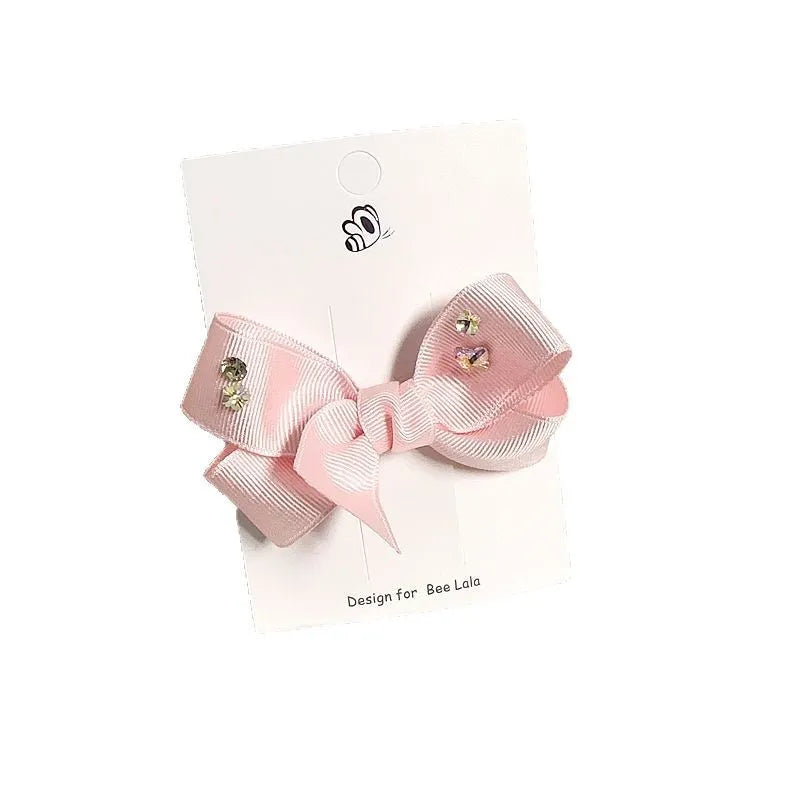 Children's press clip hair accessories set with cloth bows, sequins, pearls, and crystal flowers in pink and beige
