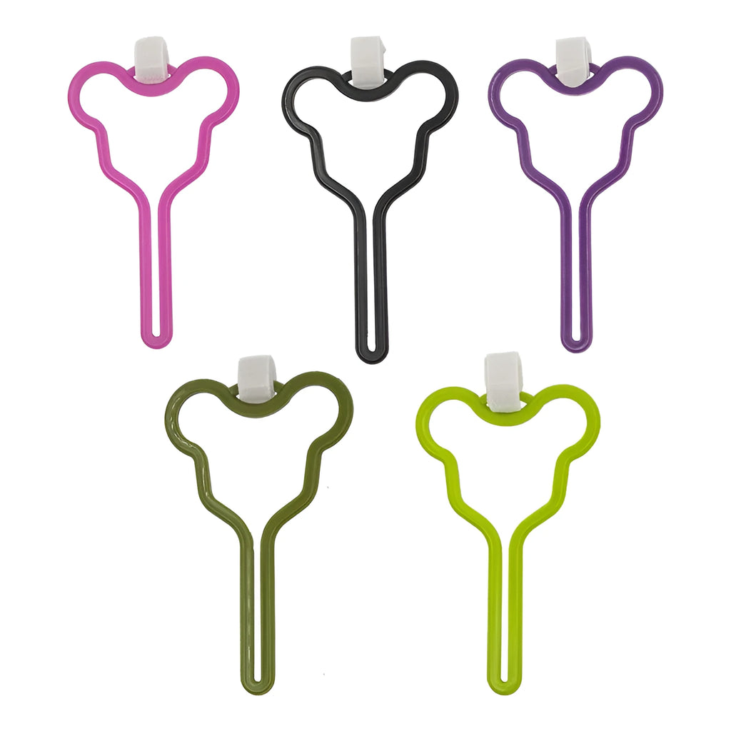 A coloured hands-free dog poop bag holder with a fixed clip and velcro strap attached to a dog leash.