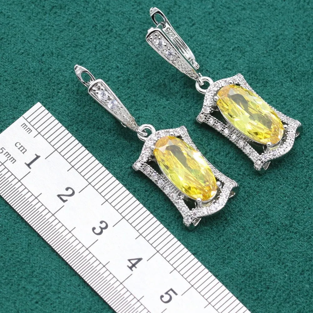 Olive and yellow anti-allergy zircon alloy jewellery set for women, showing necklace, earrings, ring, and bracelet.