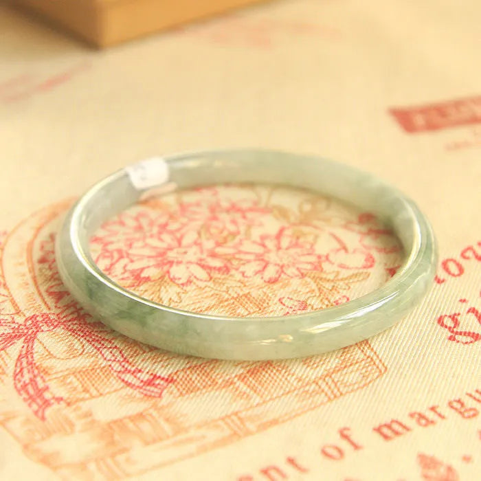 Green jade adjustable student bracelet with geometric 10mm width and traditional Chinese style