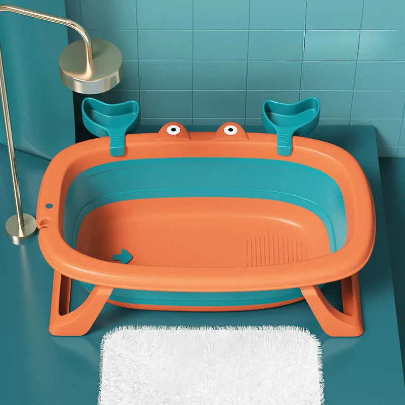Blue foldable portable pet tub set up for washing a small dog, showing its collapsible metal frame.