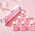 Pink goose feather badminton shuttlecocks in 6 pack on court background