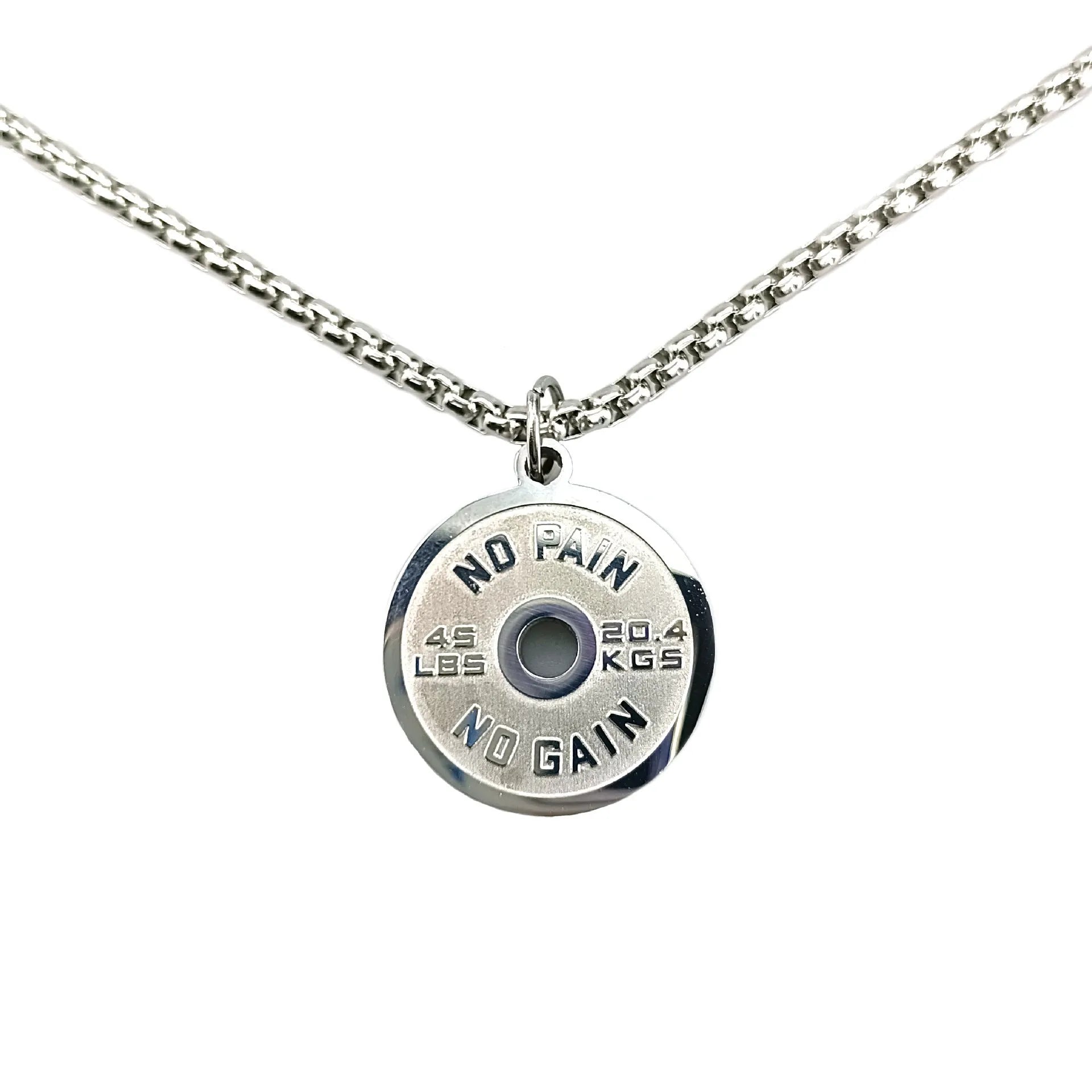 Polished stainless steel geometric barbell disk pendant on a choice of 60cm chains: black, gold, or pearl.