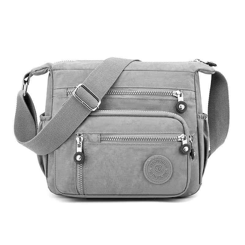 Nylon messenger shoulder bag in square vertical design with adjustable strap