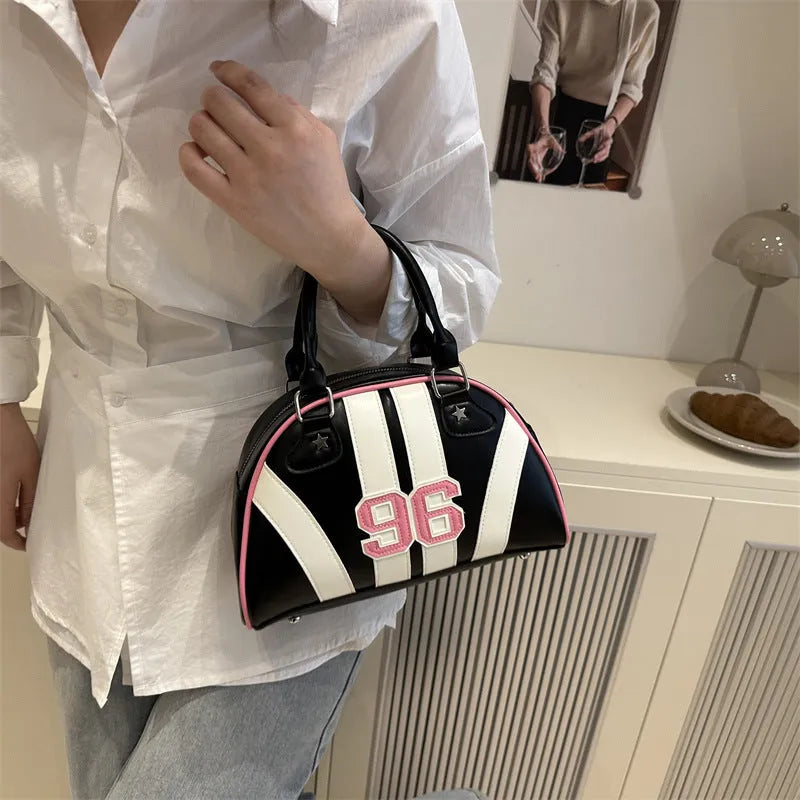 Colourful stripe contrast single shoulder bag in black with stitching and colour blocking details, PU material, dumpling shape