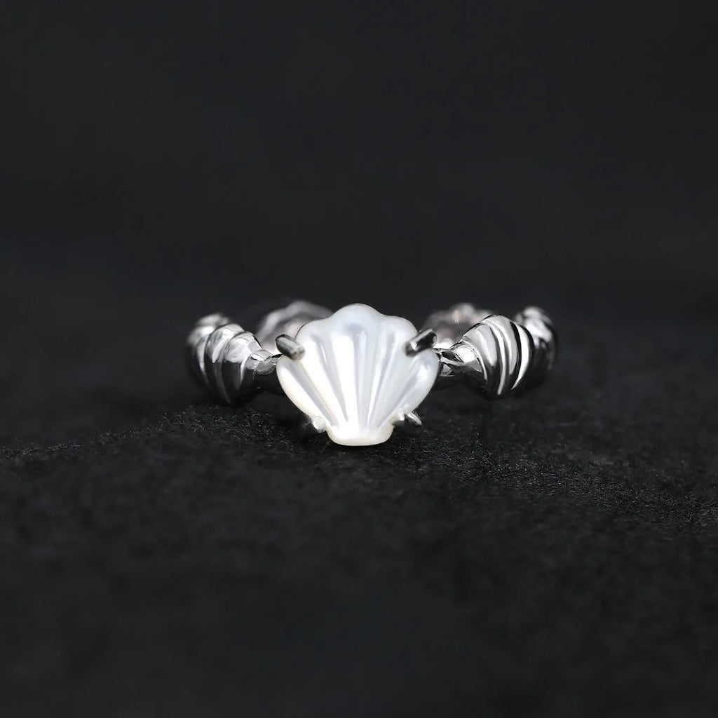 Adjustable sterling silver ring with shell elements and electroplated gold finish