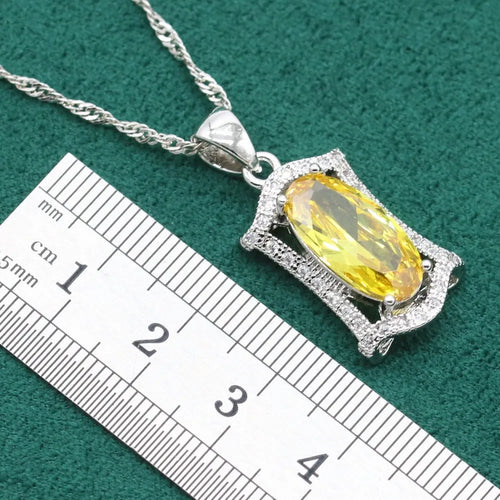 Olive and yellow anti-allergy zircon alloy jewellery set for women, showing necklace, earrings, ring, and bracelet.