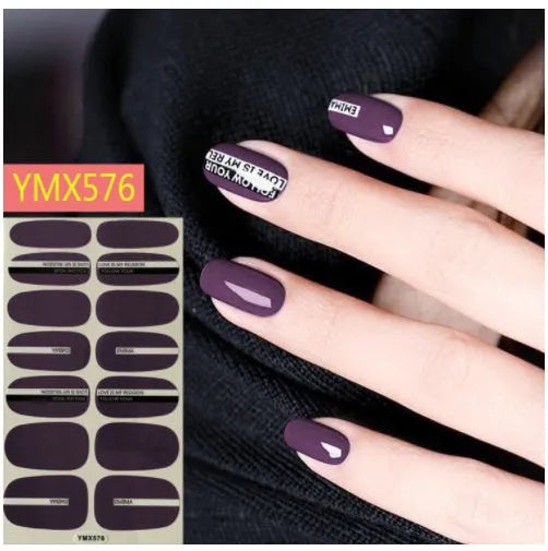 Full nail stickers set of 14 sheets showing 16 colour options in a flat lay arrangement