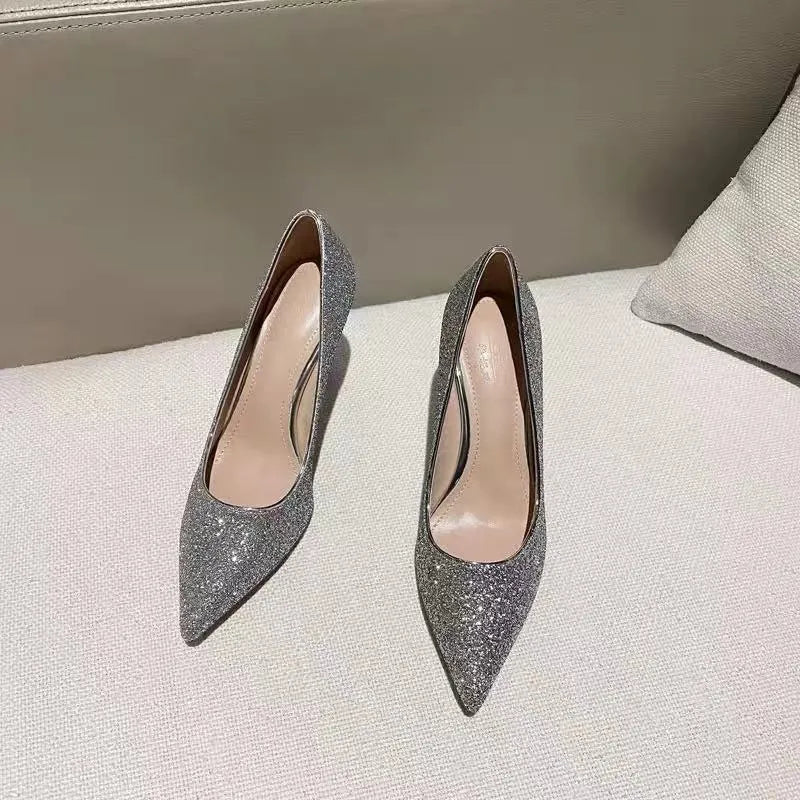 Women's silver and black stiletto wedding shoes with crystal details on a PU leather upper