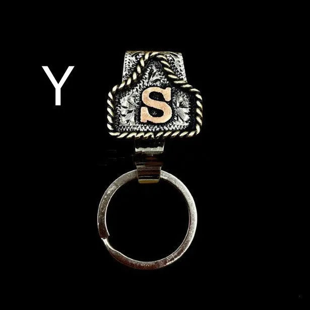 Handmade metal cow tag belt keychain in a selected colour from the A-Z letter range.