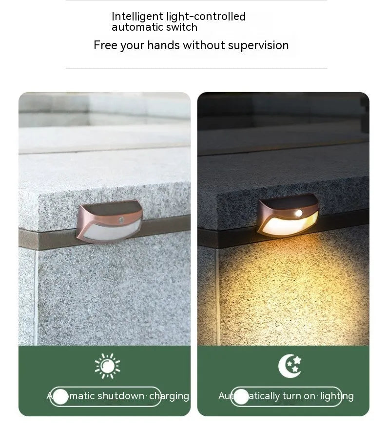 Solar-powered smiling face outdoor wall light for garden decoration