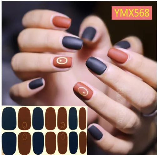 Full nail stickers set of 14 sheets showing 16 colour options in a flat lay arrangement