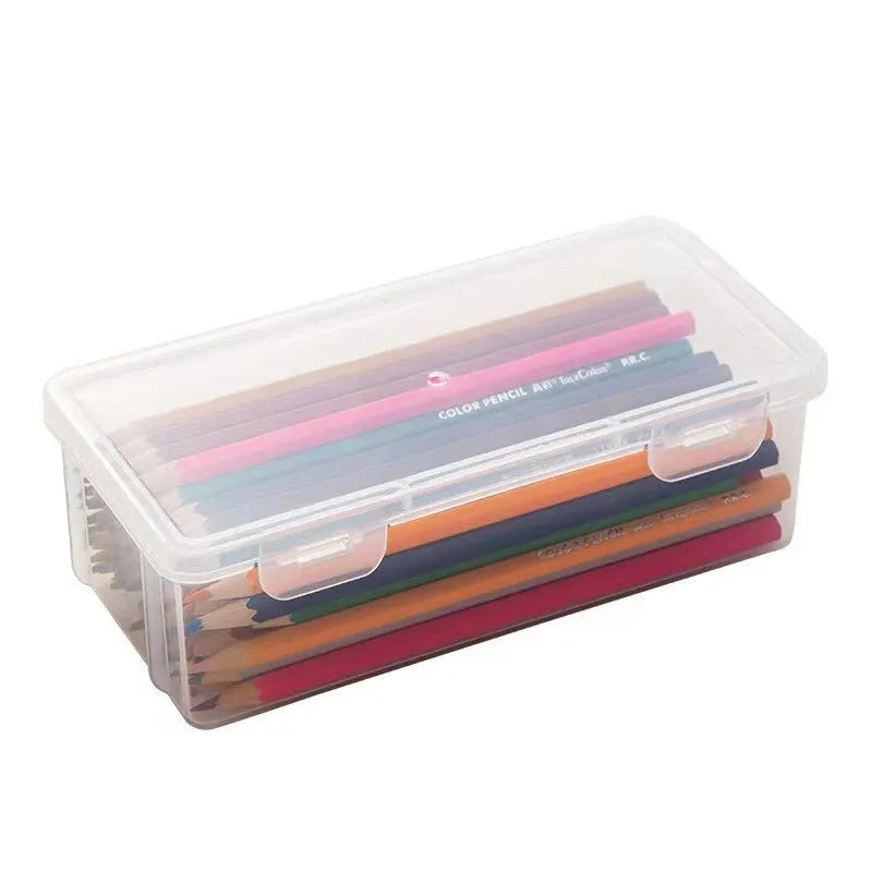 Transparent PP plastic stationery storage box with pencils and art supplies visible inside