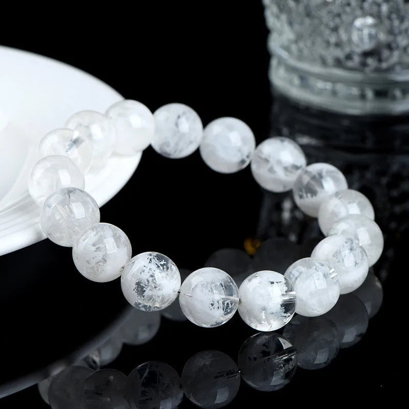 Women's crystal bracelet with natural blizzard snowflake round beads featuring Ruyi and Xiangyun traditional design elements