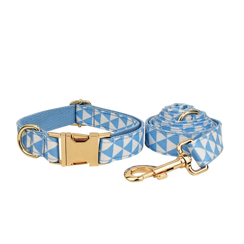 Blue triangular ring rope dog harness set with collar, lead, decorative bow and vest on cloth material