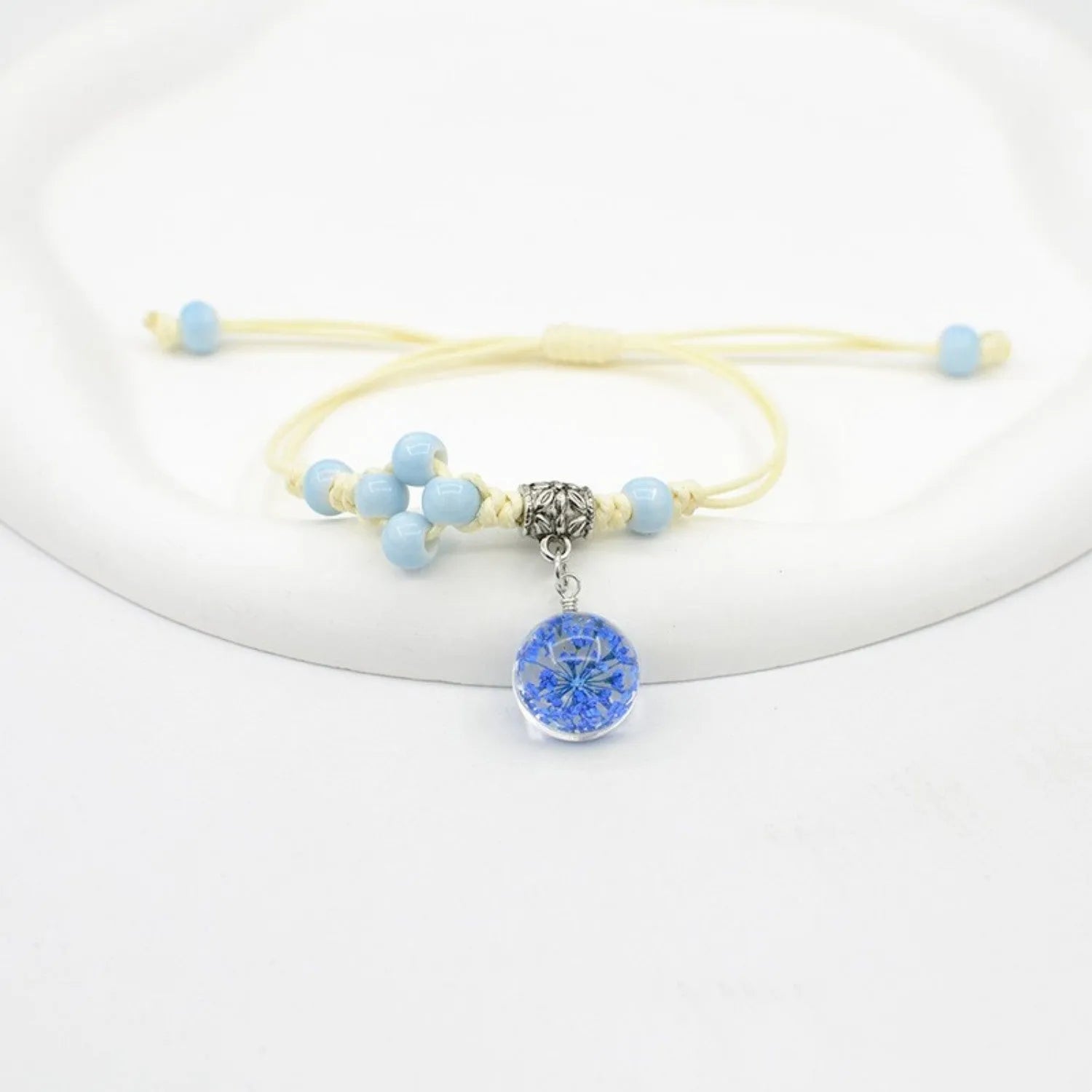 Women's hand-woven glass dried flower bracelet with large 1.4 cm beads in multiple colour options.
