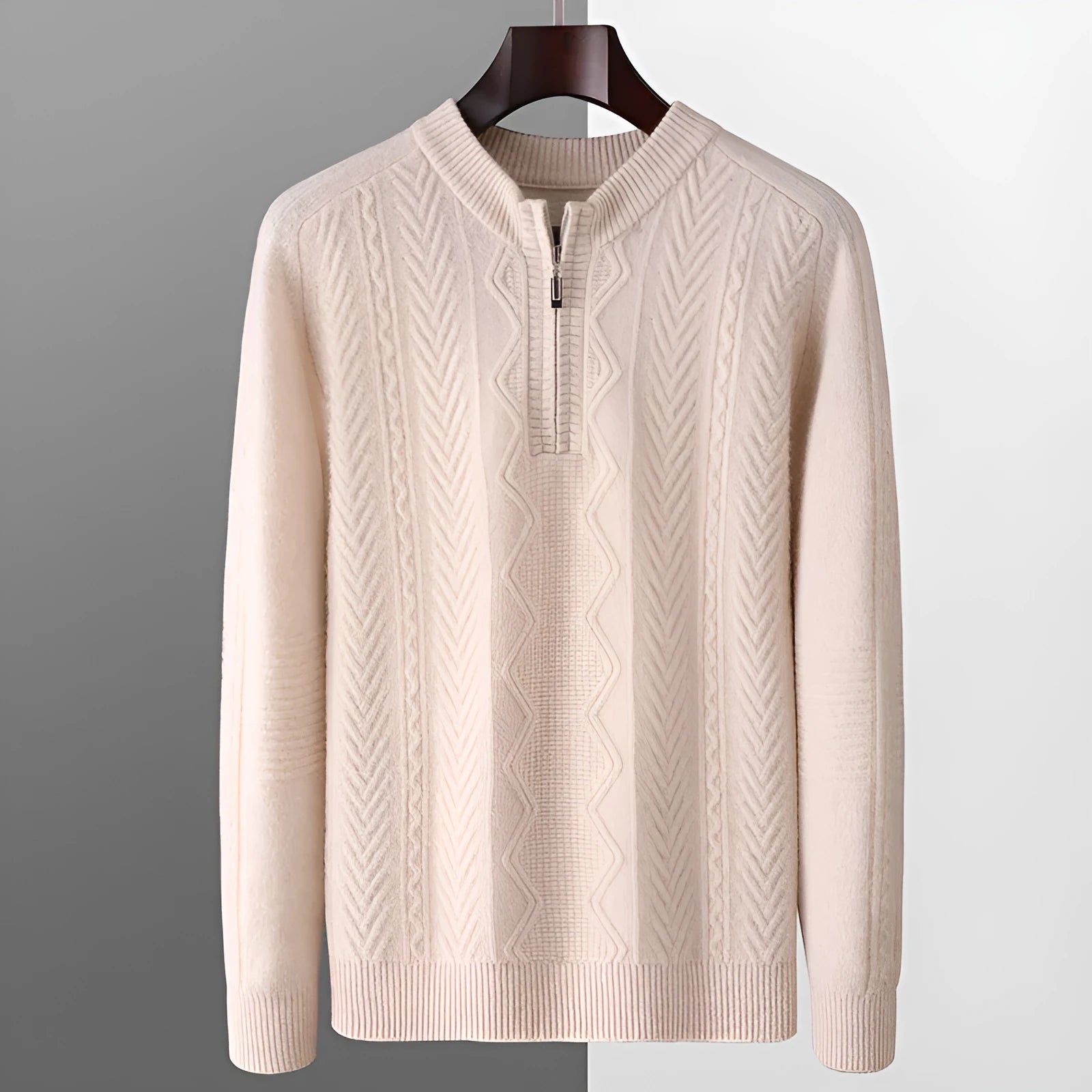 Men's grey wool half zip sweater with a diamond lattice pattern, shown on a model.