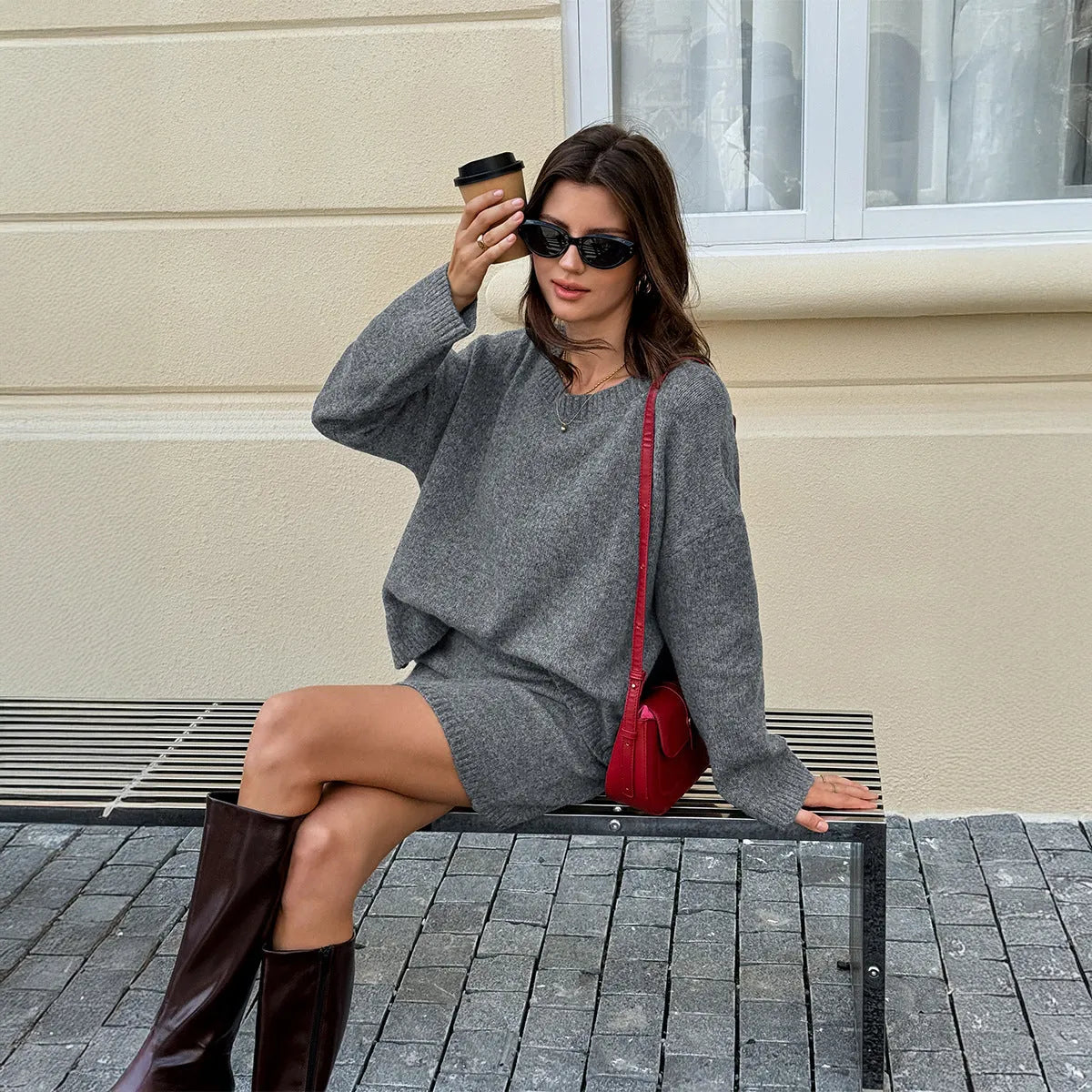 Women's solid grey wool blend knit sweater and skirt suit with long sleeves, shown as a two-piece casual set