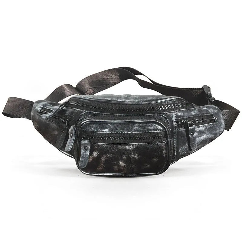 Brown leather shoulder messenger bag with a single strap and magnetic buckle closure.