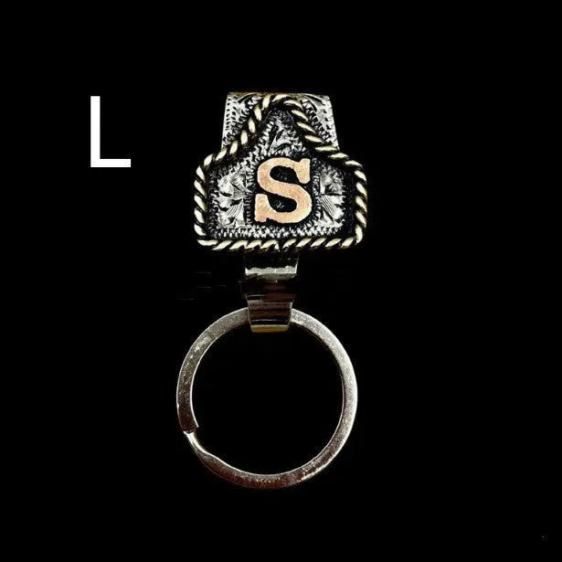 Handmade metal cow tag belt keychain in a selected colour from the A-Z letter range.