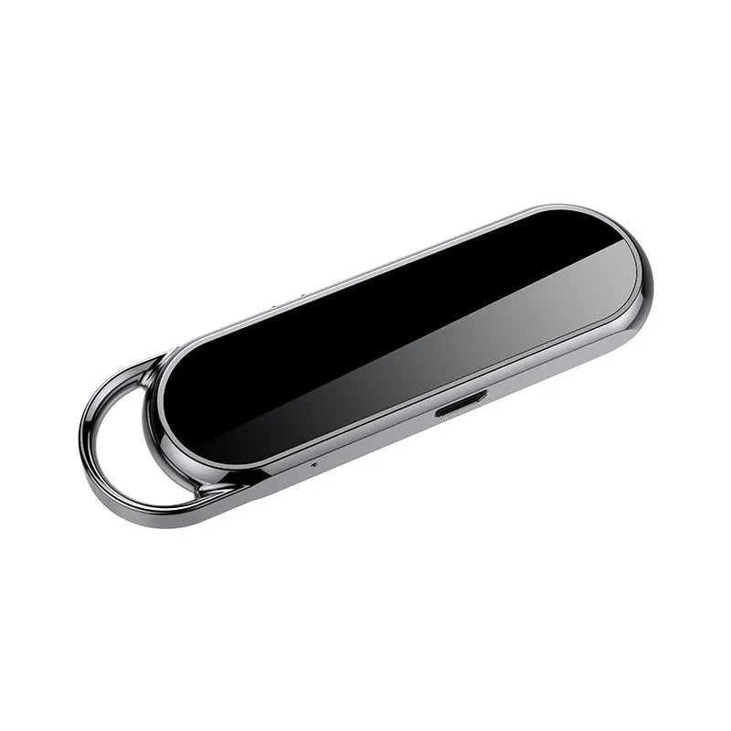Black one-key recording smart voice recorder with built-in memory, measuring 83.5x23x11 mm, on a plain background.