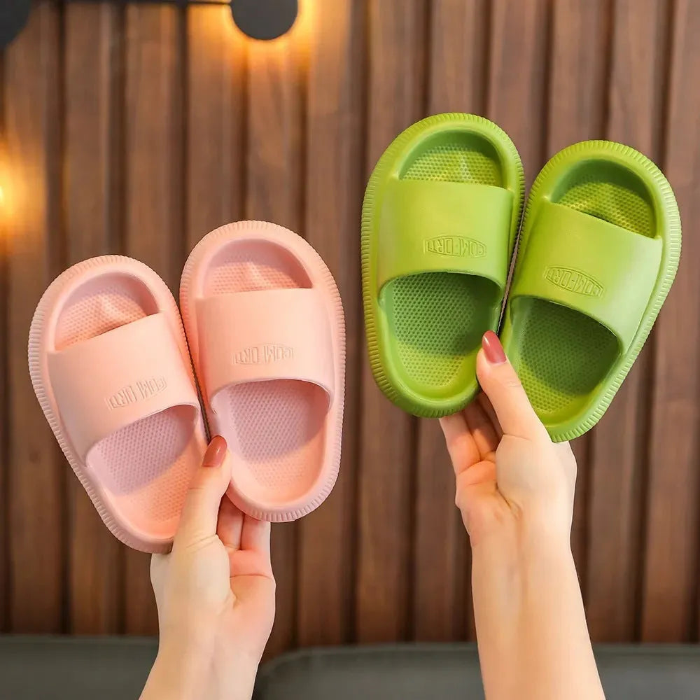 Mixed colour children's EVA slippers with a non-slip sole, shown in sizes for kids.