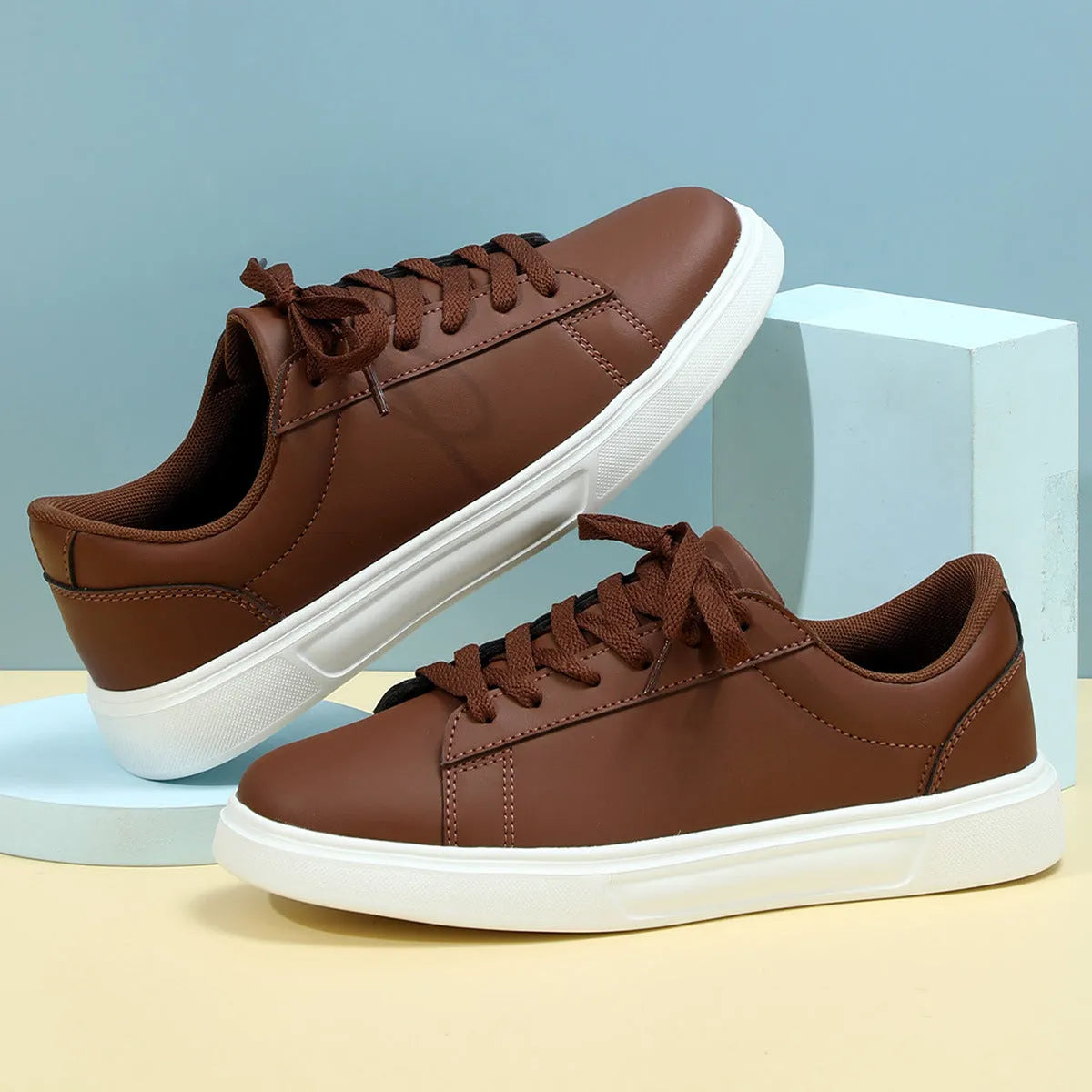 Platform skateboard sneakers in beige brown with round toe and shallow mouth design