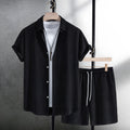 Men's white jacquard cotton blend short sleeve shirt and matching shorts laid flat.