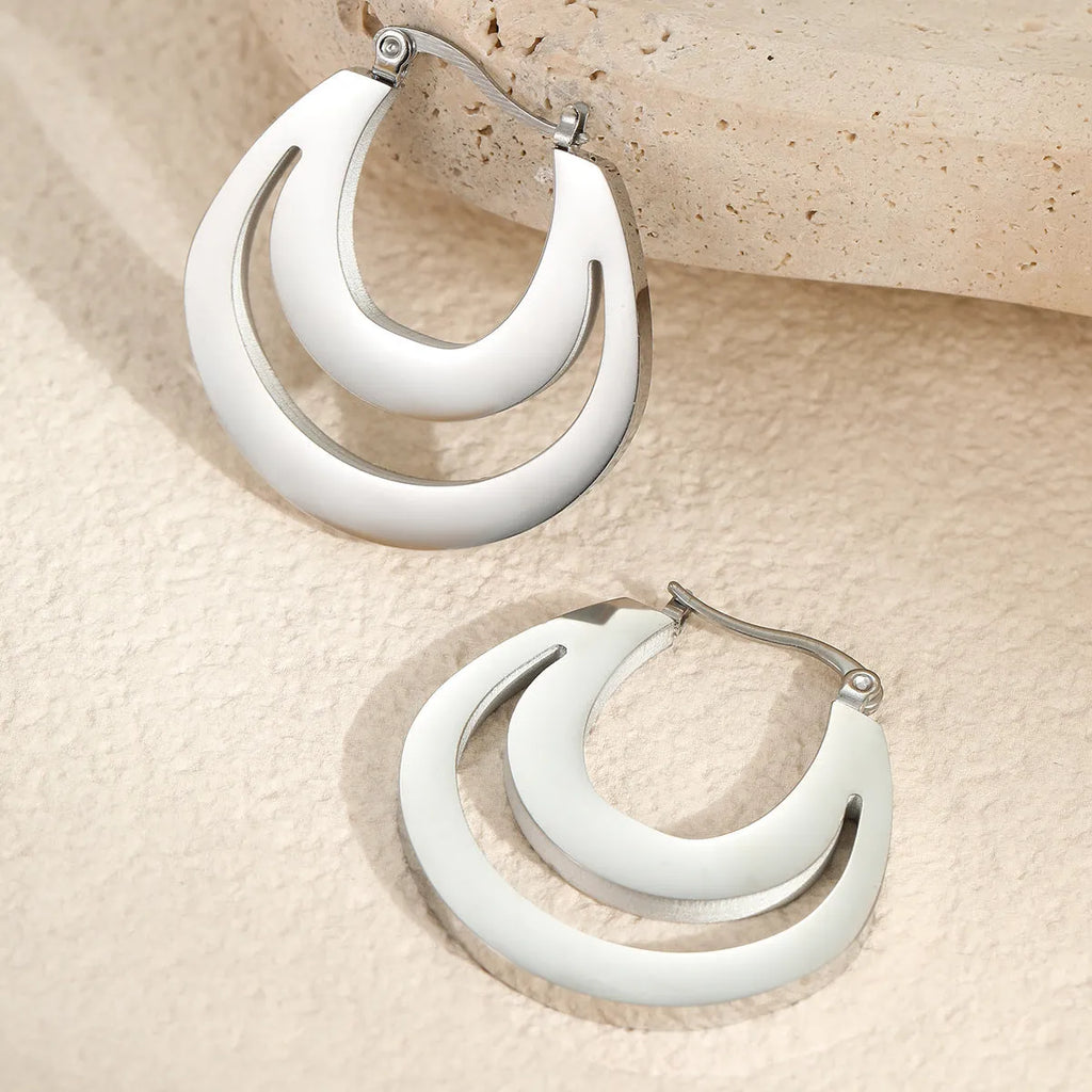 Geometric French earrings with circular ring design in gold and steel tone options