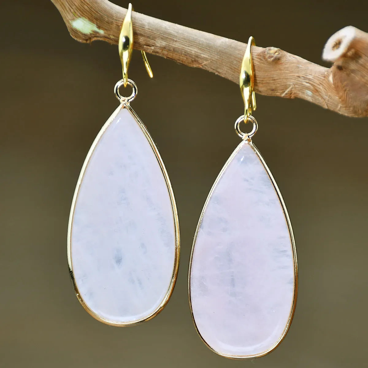 Vintage Tigereye stone drop earrings with handcrafted texture details and water drop pendant shape
