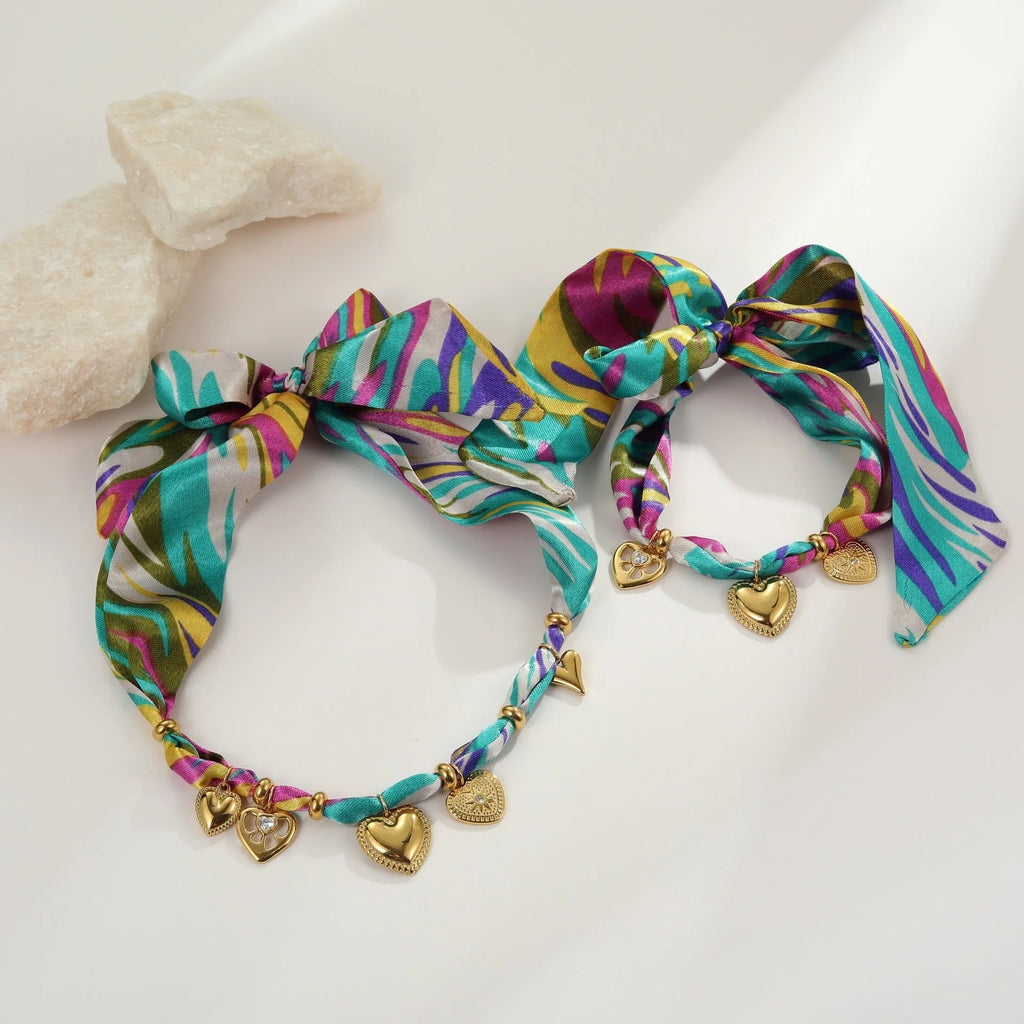 Gold-plated stainless steel necklace and bracelet set with geometric pendant on regular chain