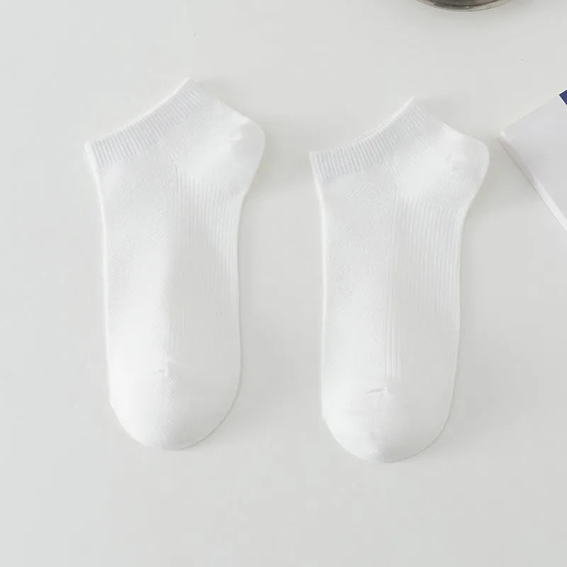 Solid colour low-cut boat socks for men made from polyester, shown in one of six available colours.