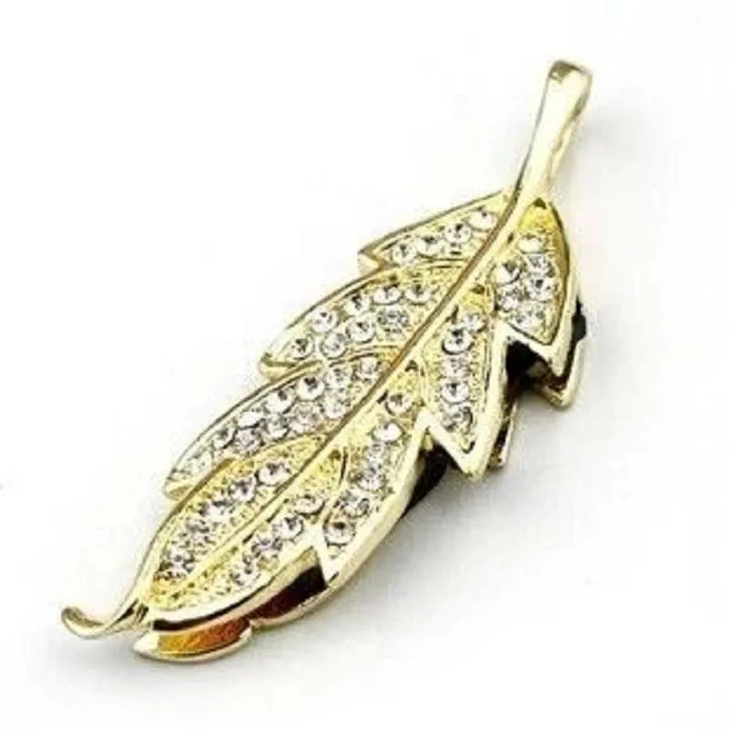 Silver metal USB flash drive with a crystal maple leaf decoration, showing front view.