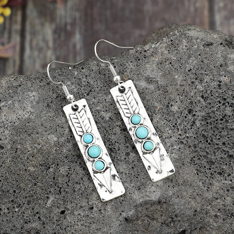 Silver geometric long strip earrings with zinc alloy construction and retro design