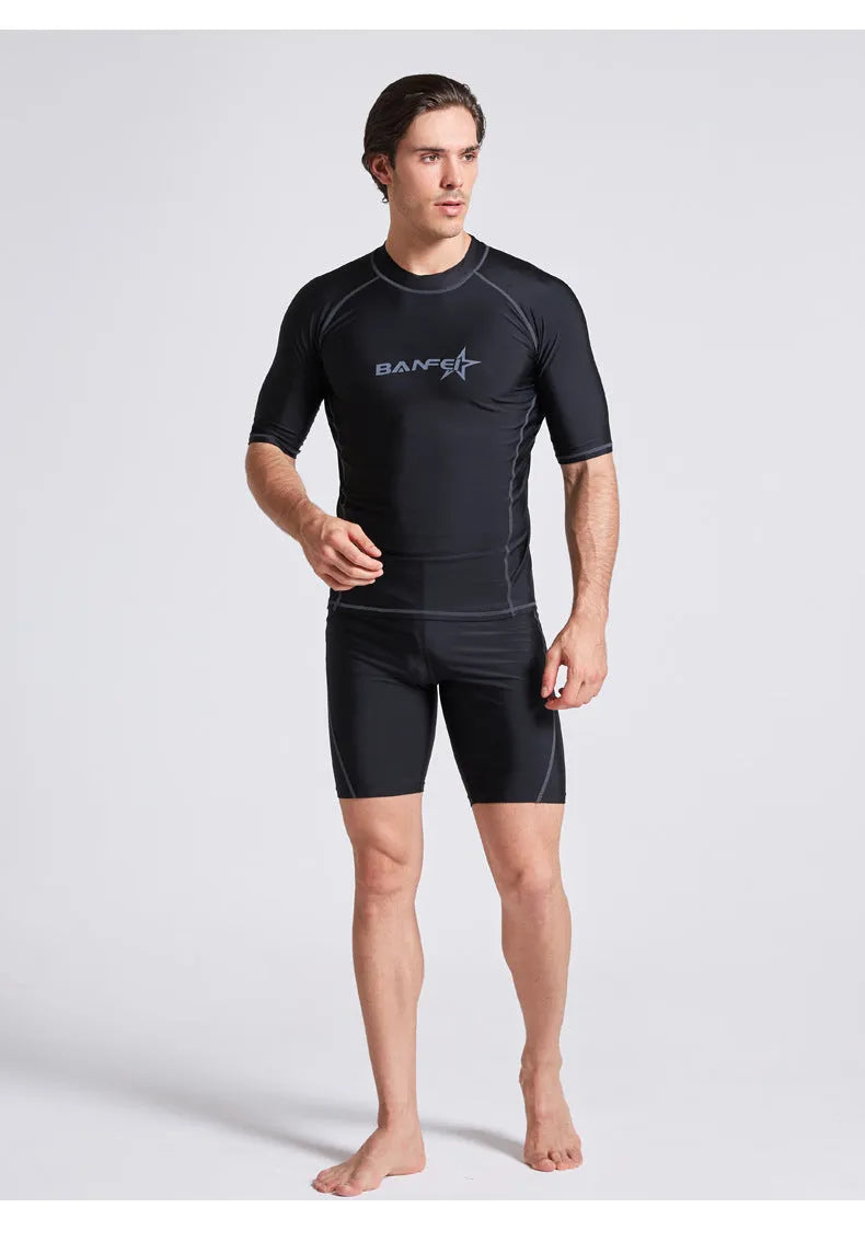 Men's half sleeve swimsuit wetsuit in nylon fabric for snorkelling and surfing activities