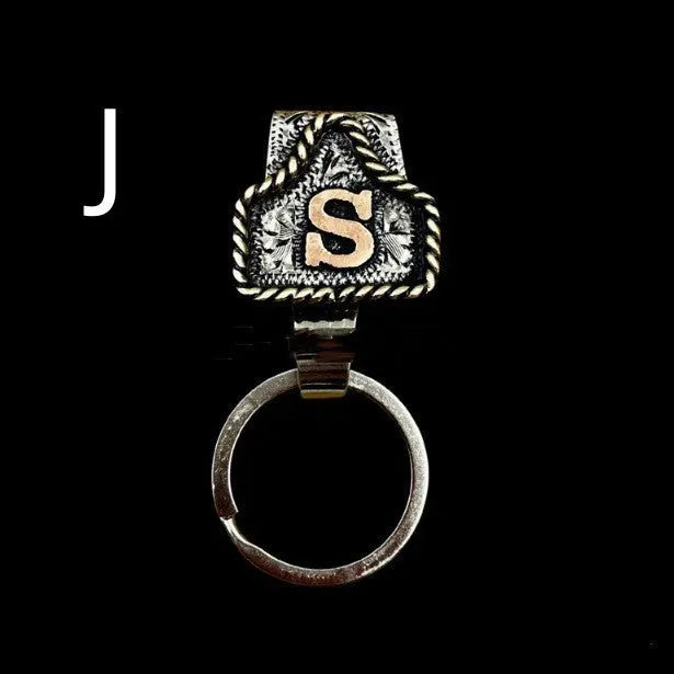 Handmade metal cow tag belt keychain in a selected colour from the A-Z letter range.