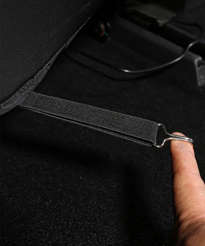 Black leather rear anti kick pad for car seat protection, showing single pocket and full coverage design